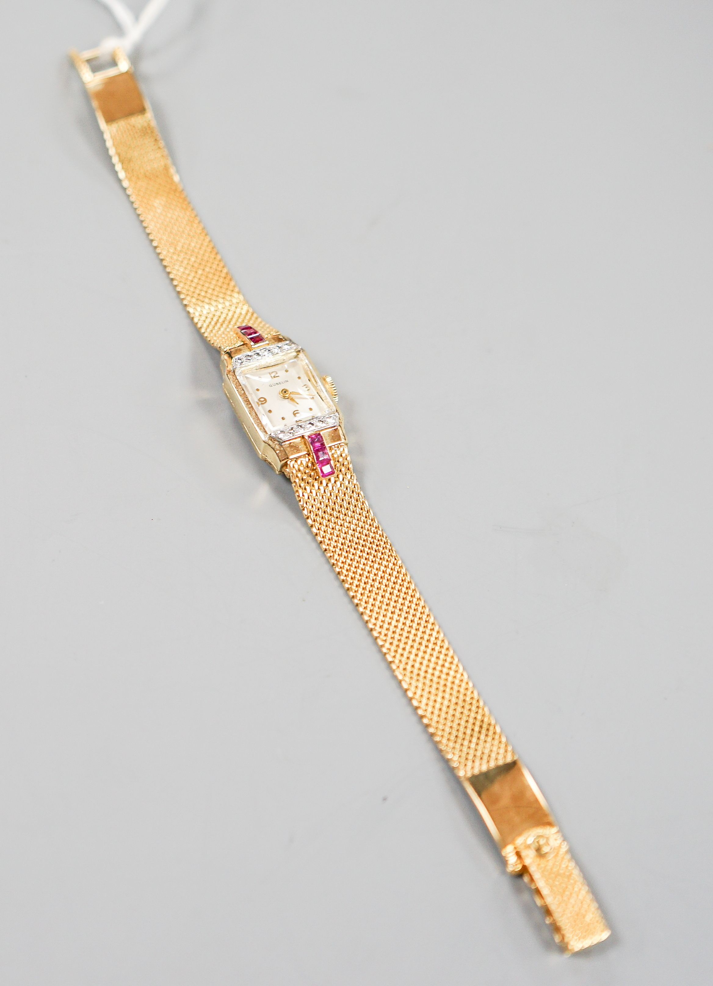 A lady's 18ct gold, ruby and diamond set Gubelin manual wind cocktail watch